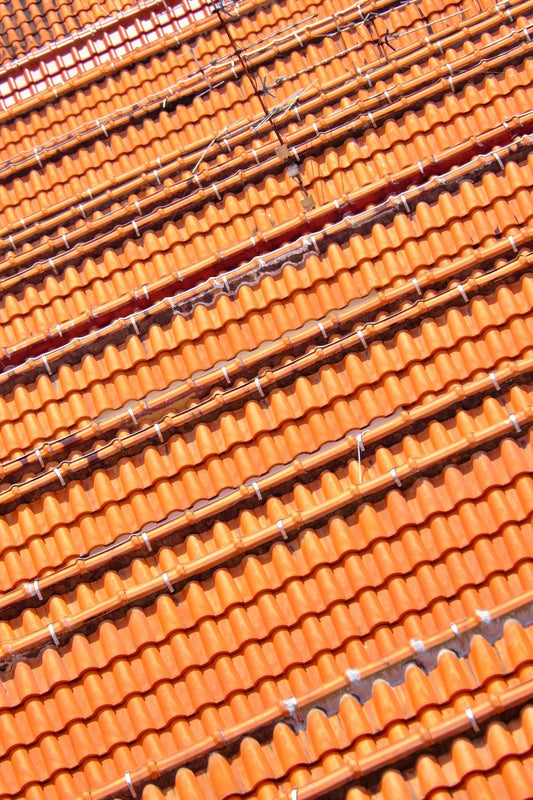 Discover the Rich Heritage and Modern Appeal of Redland Roof Tiles with a Focus on BMI Redland Rosemary Clay Classic Choices - JJ Building Materials