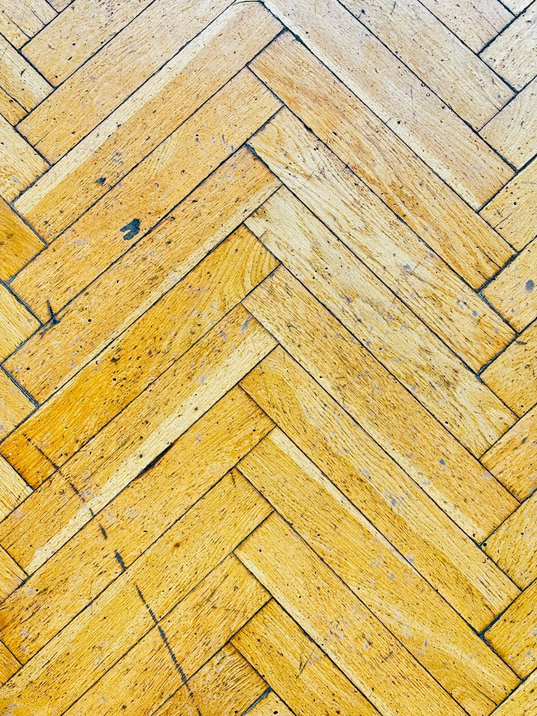 How to Successfully Mix and Match Styles with Herringbone Floors in Your Home - JJ Building Materials