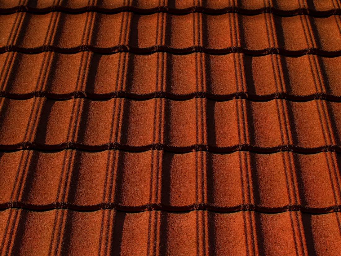 a close up of a red tile roof