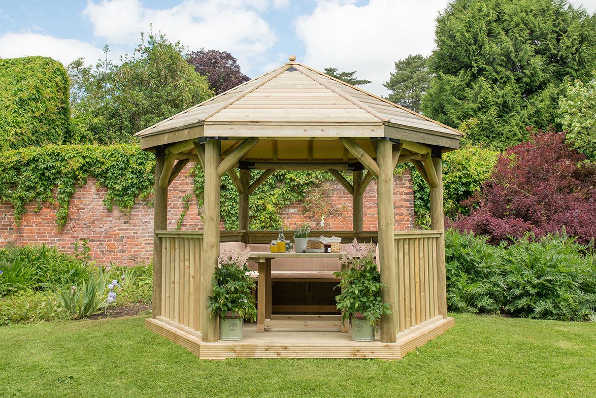 Forest 3.6m Hexagonal Wooden Garden Gazebo with Timber Roof - Furnished with Table, Benches and Cushions - JJ Building Materials