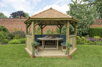 Forest 4m Hexagonal Wooden Garden Gazebo with Cedar Roof - Furnished with Table, Benches and Cushions - JJ Building Materials